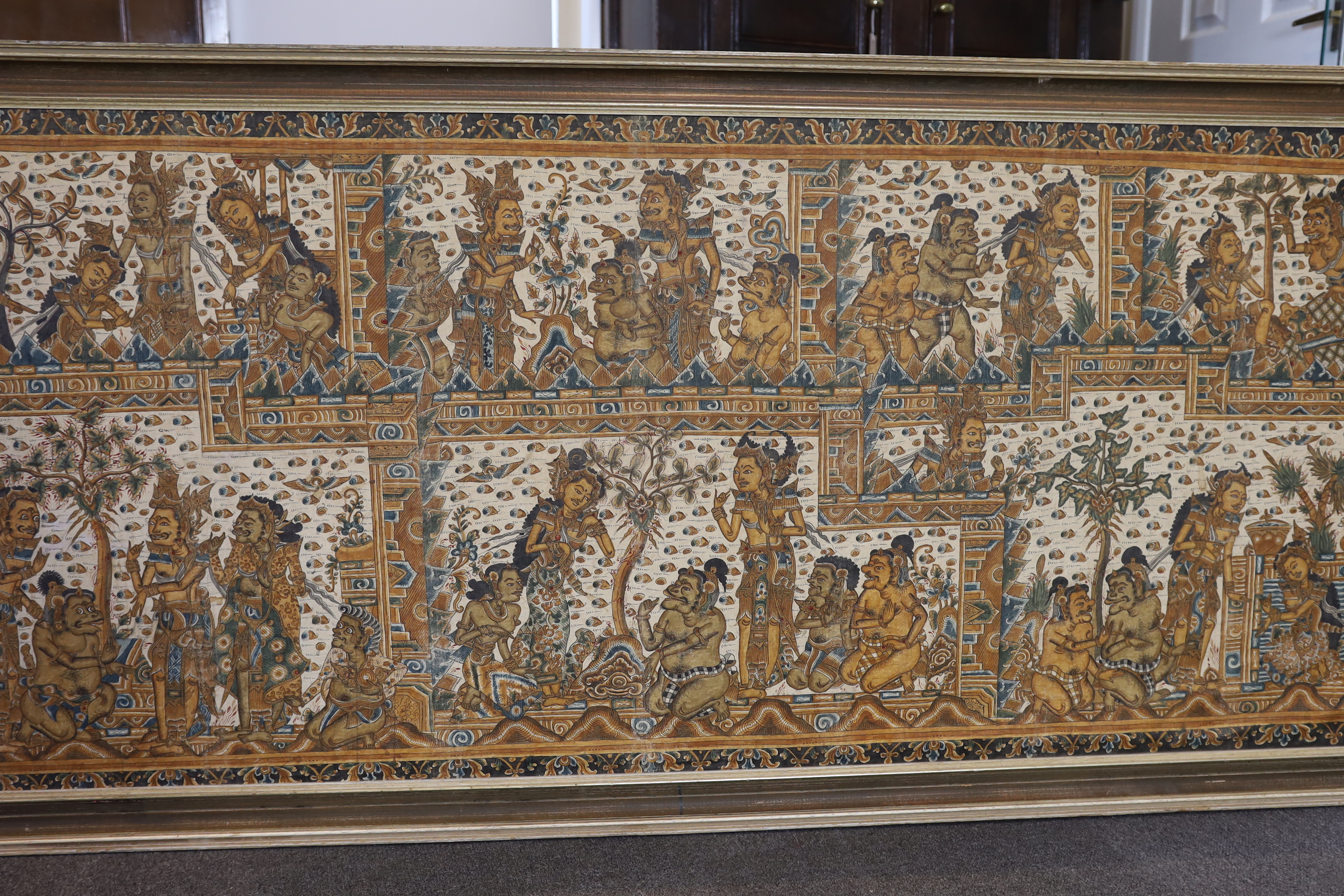 Kamasan School, a large early 20th century Balinese screenprint, 206cm x 82cm